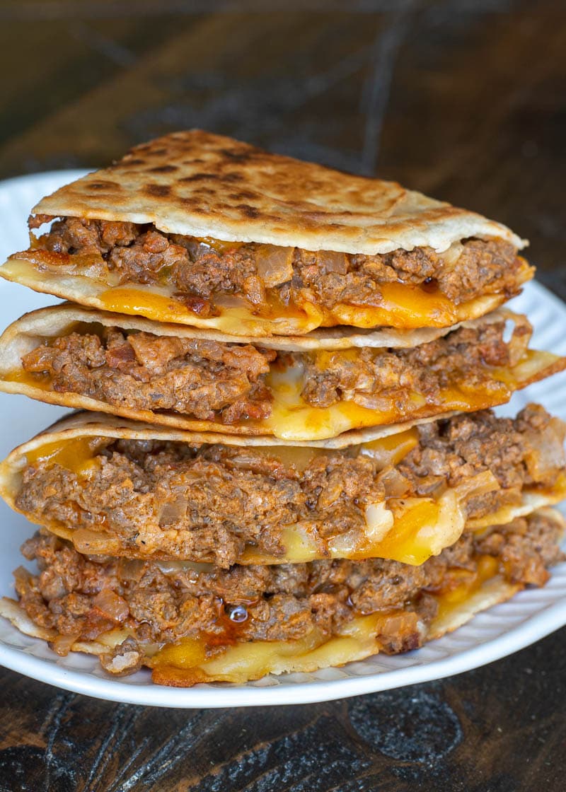 These Bacon Cheeseburger Quesadillas have all the flavor of a loaded burger with minimal effort! If using a low carb tortilla each Cheeseburger Quesadilla can be made keto-friendly and is about 6 net carbs per serving!