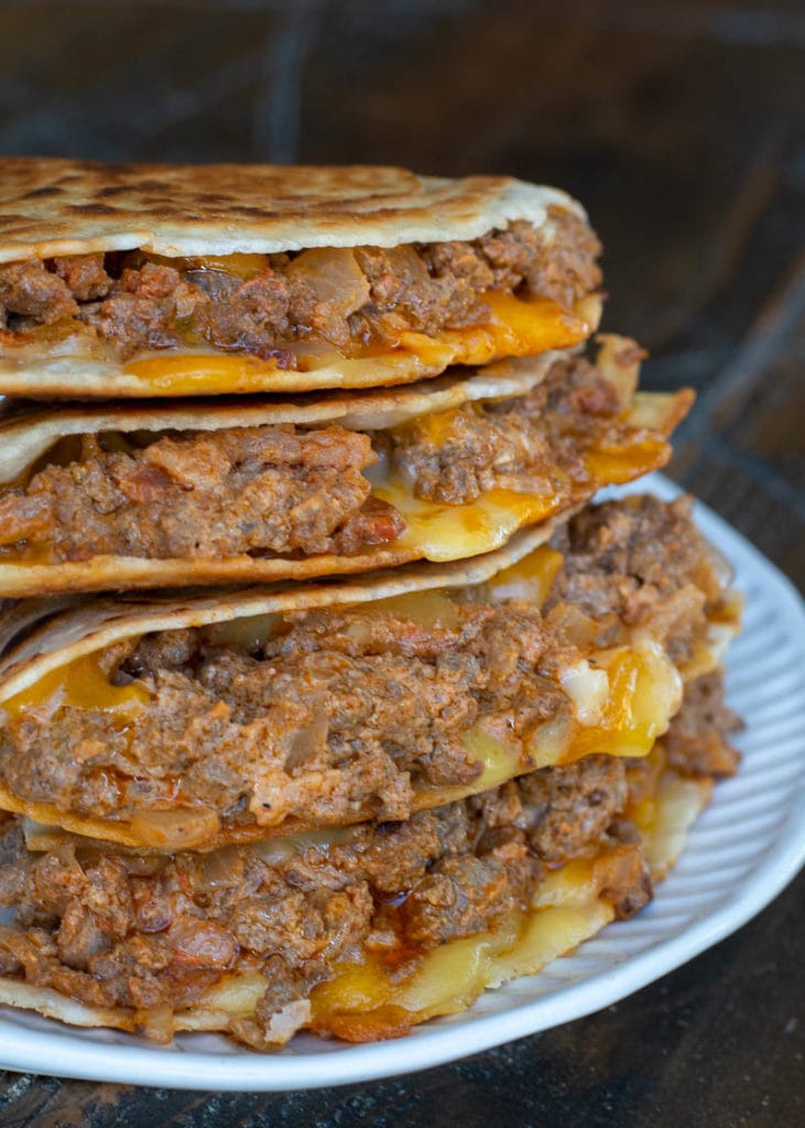 These Bacon Cheeseburger Quesadillas have all the flavor of a loaded burger with minimal effort! If using a low carb tortilla each Cheeseburger Quesadilla can be made keto-friendly and is about 6 net carbs per serving!