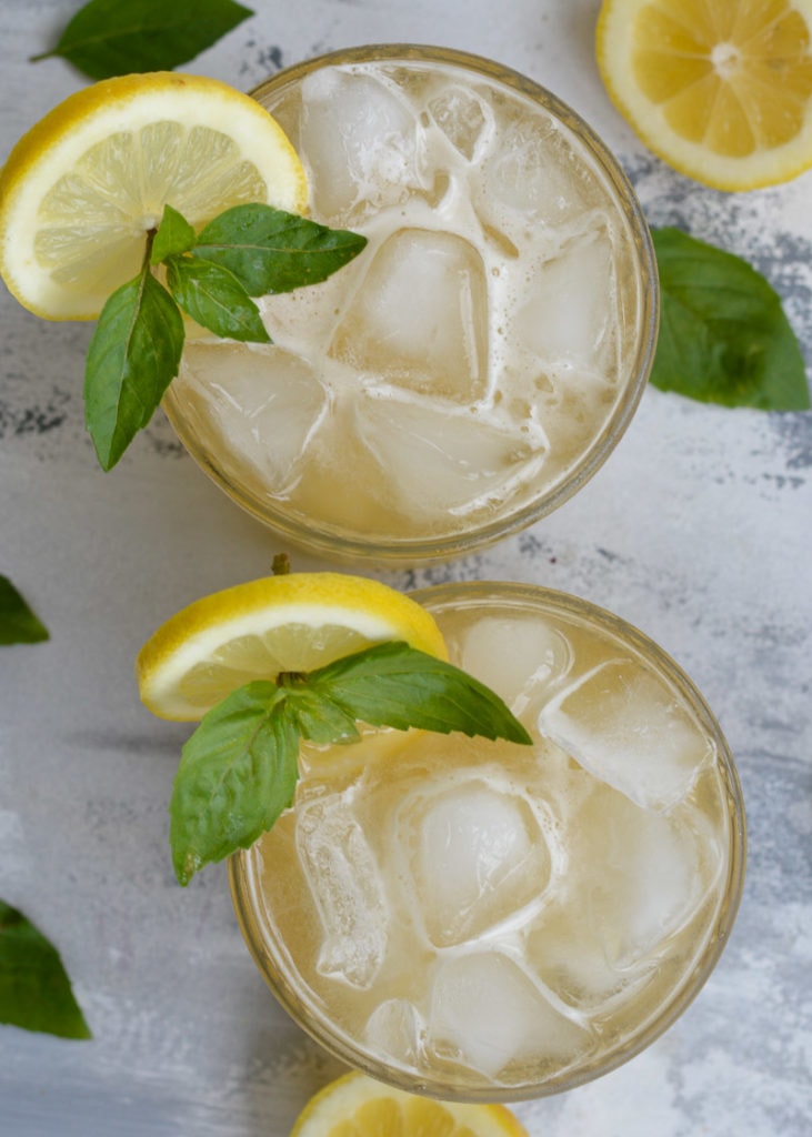 This Basil Whiskey Sour is sugar free and perfect for a keto cocktail! A classic bourbon drink with an herby twist makes for your new favorite summer drink... All for under 2 net carbs each!