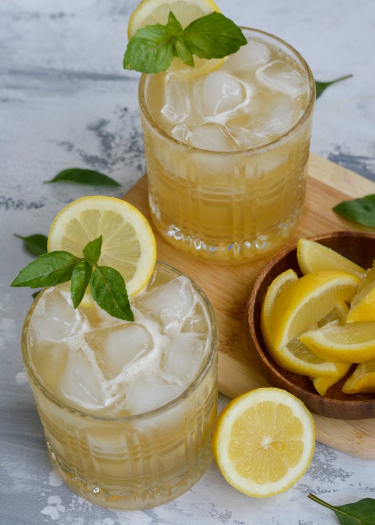 This Basil Whiskey Sour is sugar free and perfect for a keto cocktail! A classic bourbon drink with an herby twist makes for your new favorite summer drink... All for under 2 net carbs each!