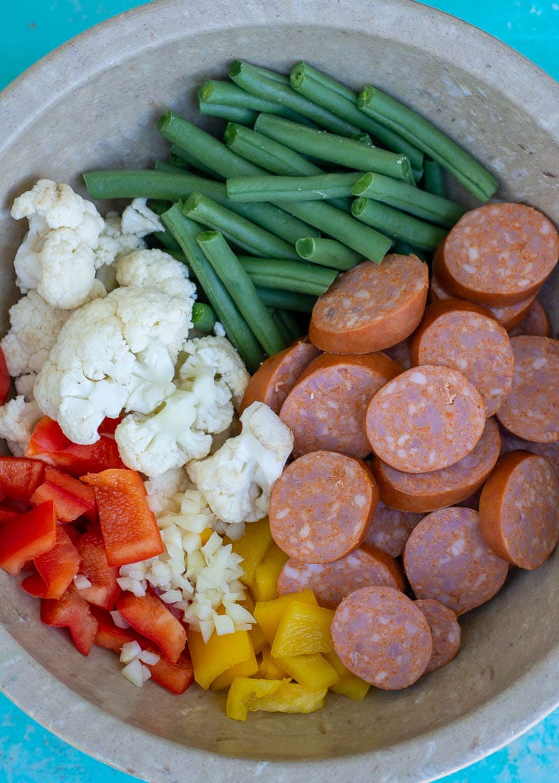 This BBQ Chicken and Smoked Sausage Skillet is the perfect one pan dinner! This meal is loaded with veggies and protein and is about 4 net carbs!