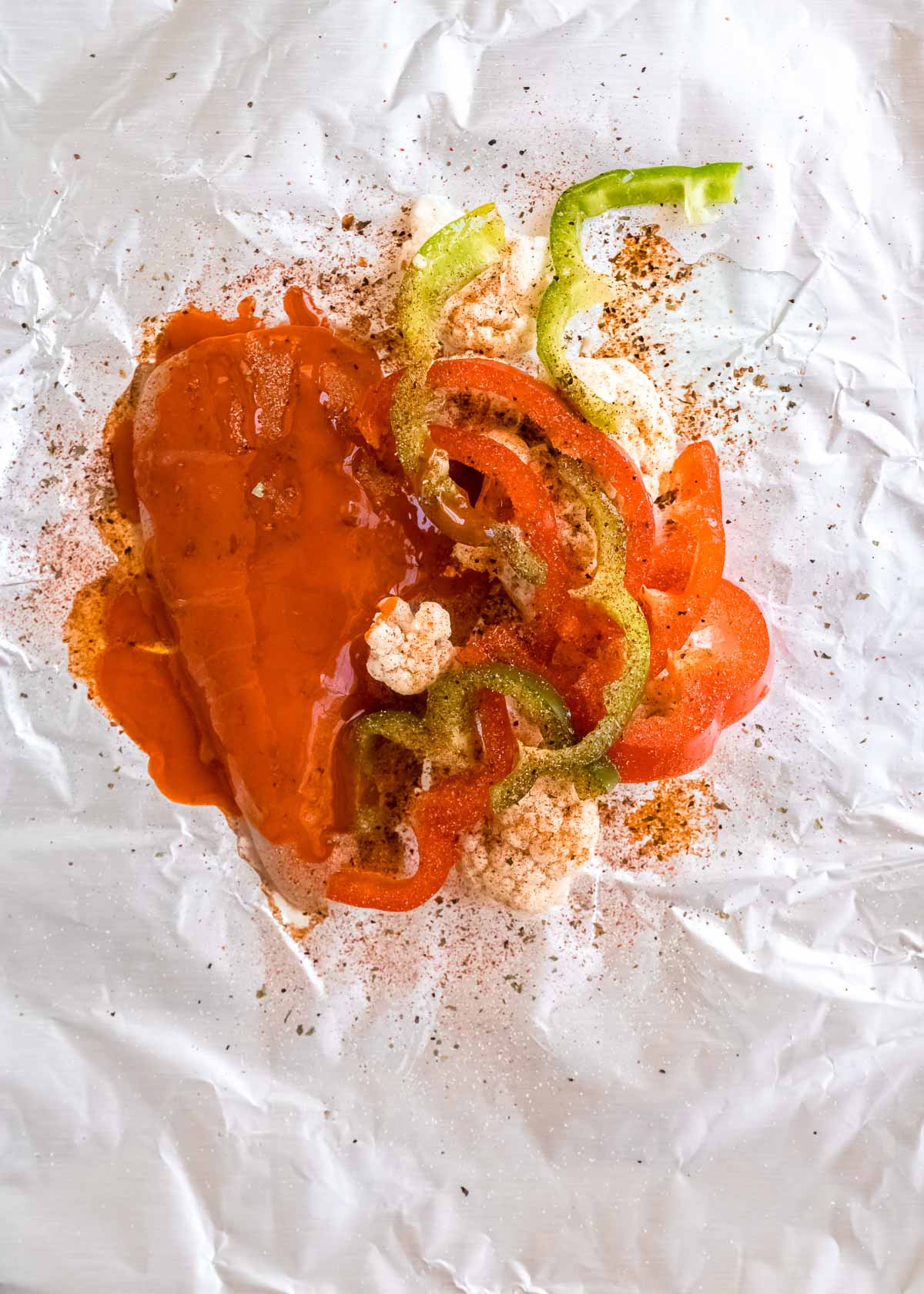 buffalo chicken ingredients on open foil pack