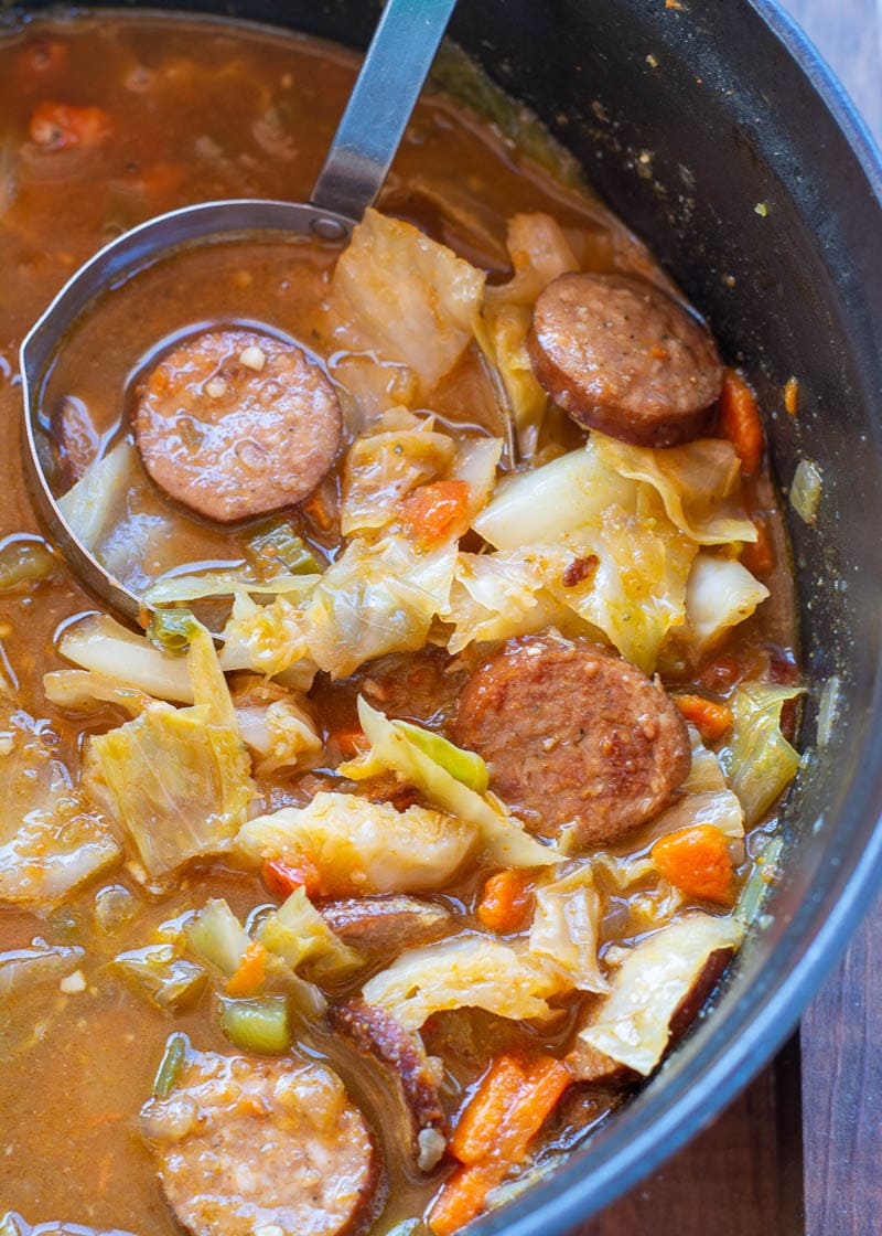 This Cabbage and Sausage Soup is the perfect way to warm up on a chilly night! This soup is rich, comforting and about 5 net carbs a bowl!