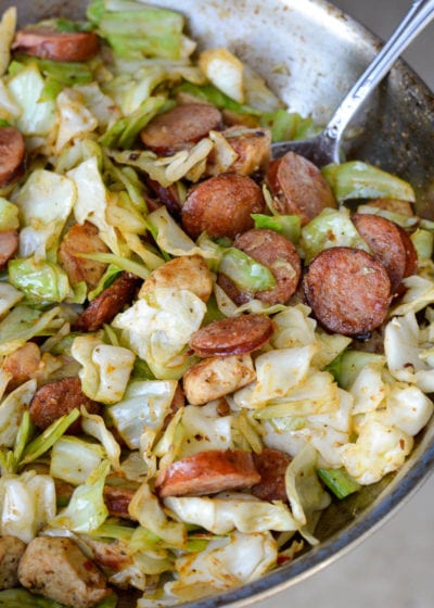  A healthy one pan meal your family will adore, this Cajun Chicken Sausage and Cabbage Skillet will be on your table in less than 3o minutes! Keto friendly and loved by all ages, this meal will disappear almost as quickly as it came together!