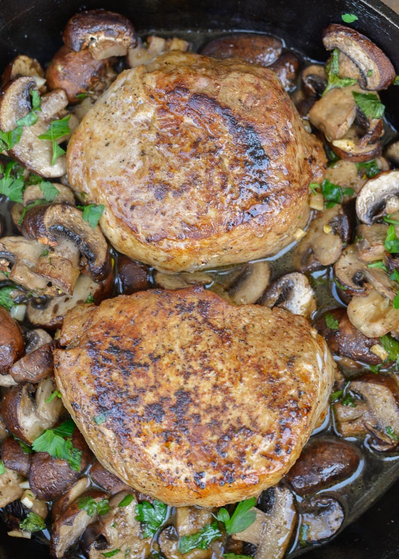 These Cast Iron Pork Chops with Mushrooms is the perfect low-carb weeknight dinner for two! Ready in under 30 minutes with just 8 net carbs, this keto-friendly dinner will be a quick favorite!