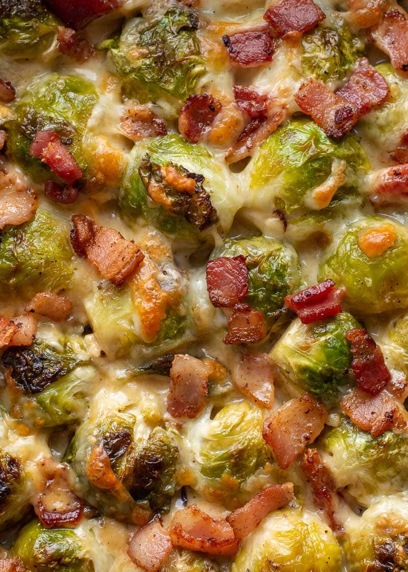 These Cheesy Brussels Sprouts with Bacon are made in one pan and perfect for entertaining! This easy vegetable side dish is low carb and keto-friendly! 