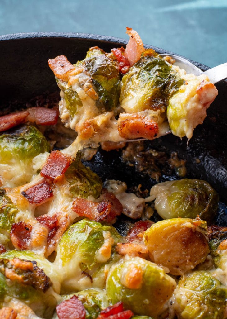 These Cheesy Brussels Sprouts with Bacon are made in one pan and perfect for entertaining! This easy vegetable side dish is low carb and keto-friendly! 