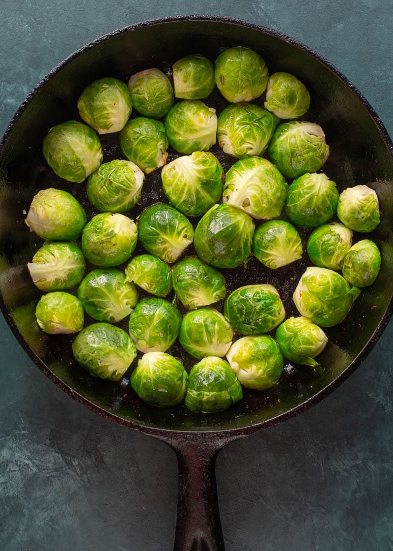 These Cheesy Brussels Sprouts with Bacon are made in one pan and perfect for entertaining! This easy vegetable side dish is low carb and keto-friendly! 