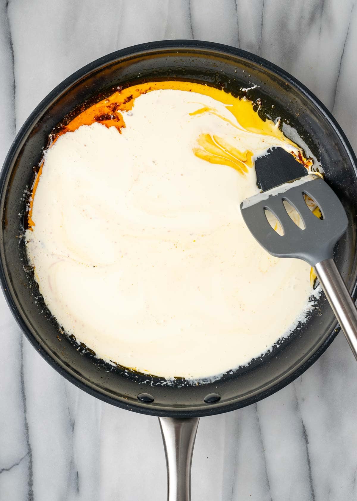 cream sauce in cast iron skillet