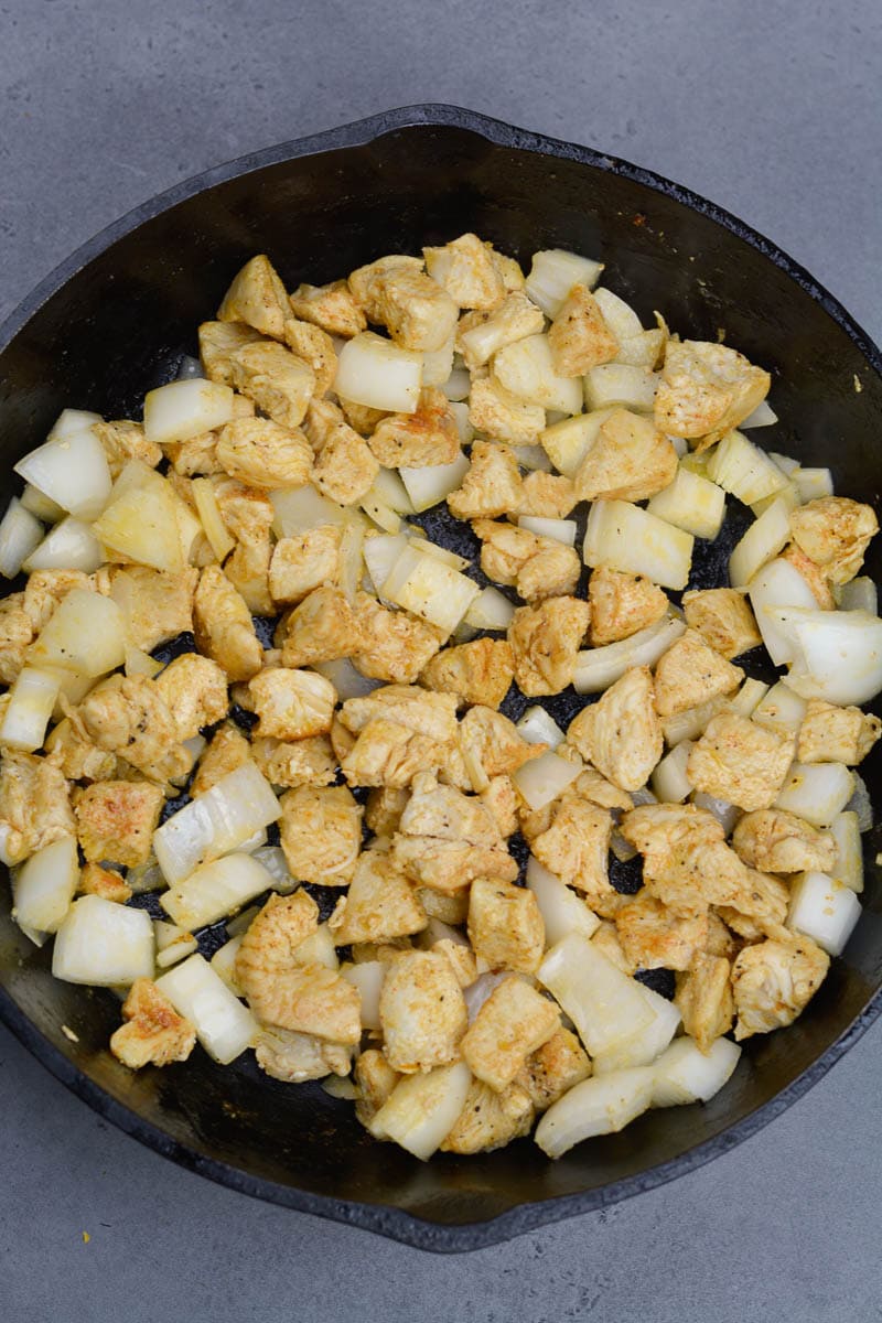 Try this Chicken Philly Cheesesteak Skillet packed with pan seared chicken, mushrooms, bell peppers and onions. This easy one pan recipe has less than 5 net carbs per serving! 