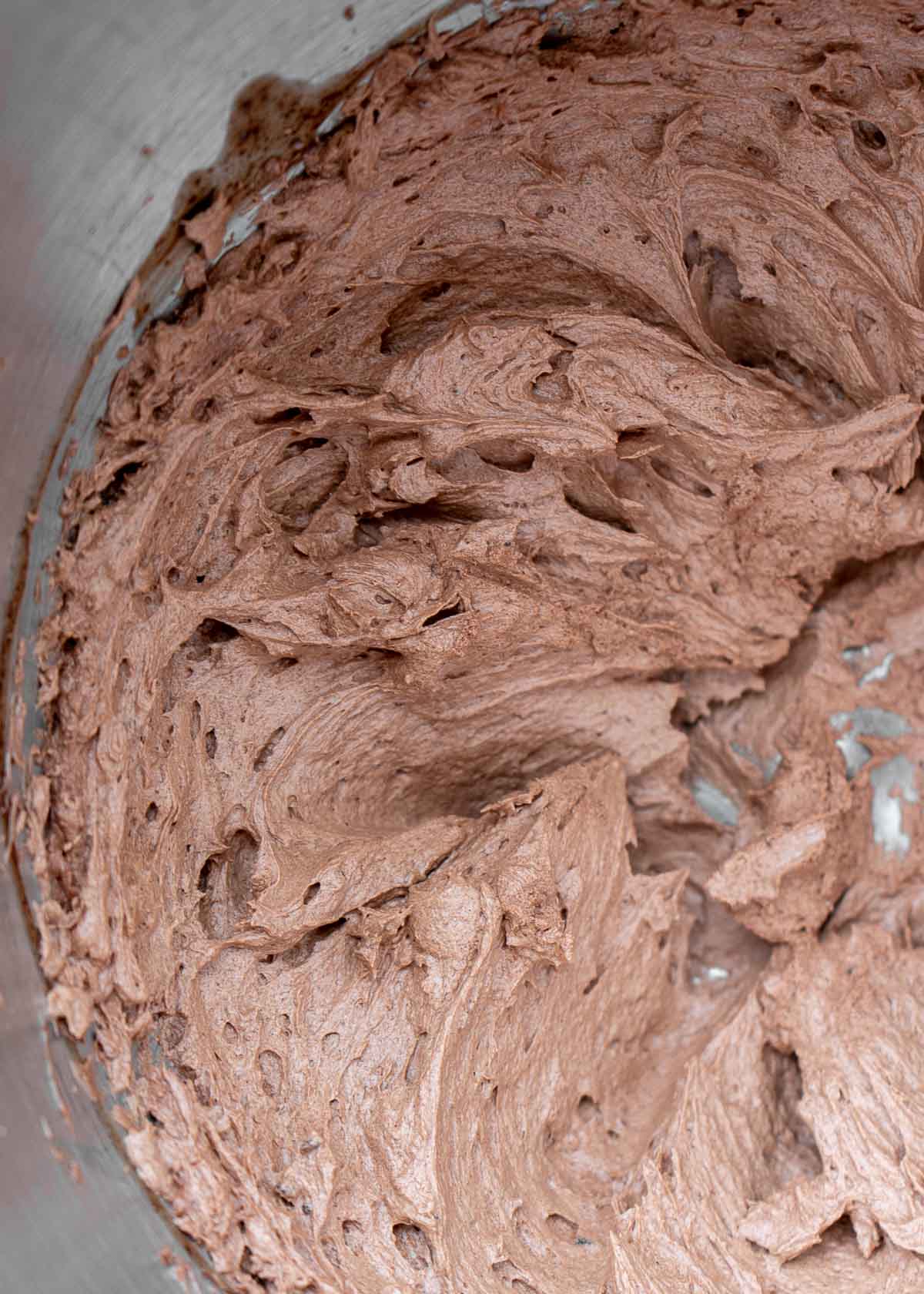 whipped ganache frosting in a bowl