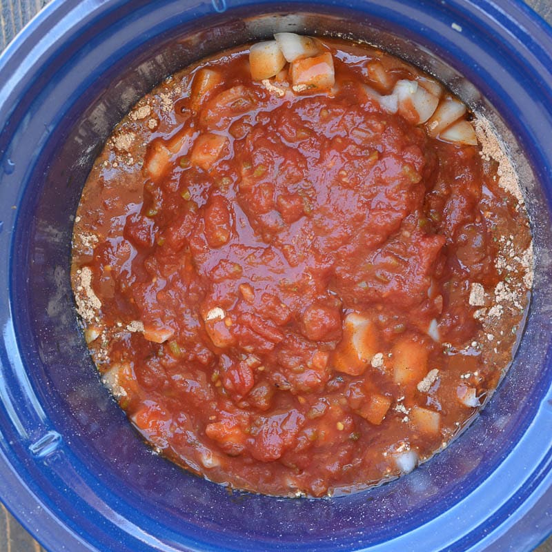 This Crock Pot Salsa Chicken is the best set it and forget it meal! Tender shredded chicken is combined with taco seasoning, enchilada sauce and garlic for a flavor packed easy dinner recipe that is perfect for keto meal prep!