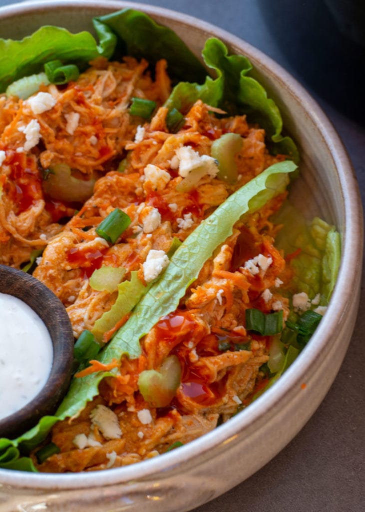 This Crockpot Buffalo Chicken is going to become one of your favorites for keto meal prep! This chicken recipe is easy, delicious and under 2 net carbs!