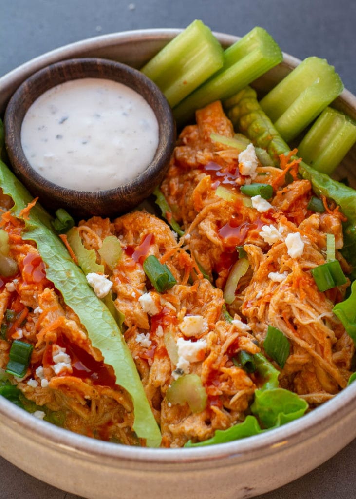 This Crockpot Buffalo Chicken is going to become one of your favorites for keto meal prep! This chicken recipe is easy, delicious and under 2 net carbs!