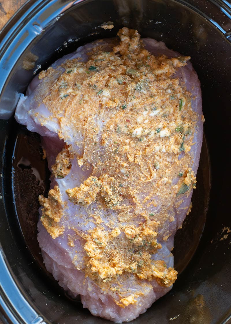 This Crockpot Turkey Breast is the perfect foolproof turkey recipe! This turkey breast is smothered in an herb butter and comes out perfectly tender and juicy every single time! 