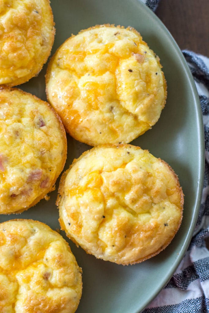 Crustless Ham and Cheese Quiche Cups are only about 1 net carb each. This is a great breakfast meal prep recipe to make for busy weeks! 