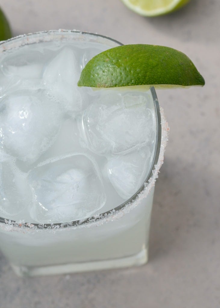 This Keto Margarita is a low-carb, low-calorie dream! Using a sugar-free simple syrup makes this keto alcoholic drink under 2 net carbs and about 100 calories each-- perfect for Taco Tuesday!