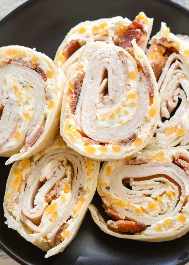 These Easy Keto Pinwheels are made on a low carb tortilla and loaded with zesty ranch, deli turkey, salty bacon and cheddar cheese! Enjoy a generous serving for less than 5 net carbs! 