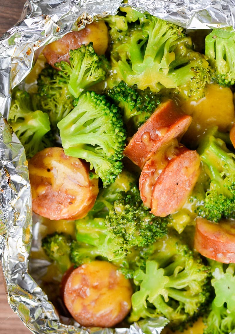 These Sausage Broccoli Cheddar Foil Packs have just three ingredients, are under 7 net carbs and ready in about 20 minutes! This is a simple foil pack recipe perfect for the grill or oven!