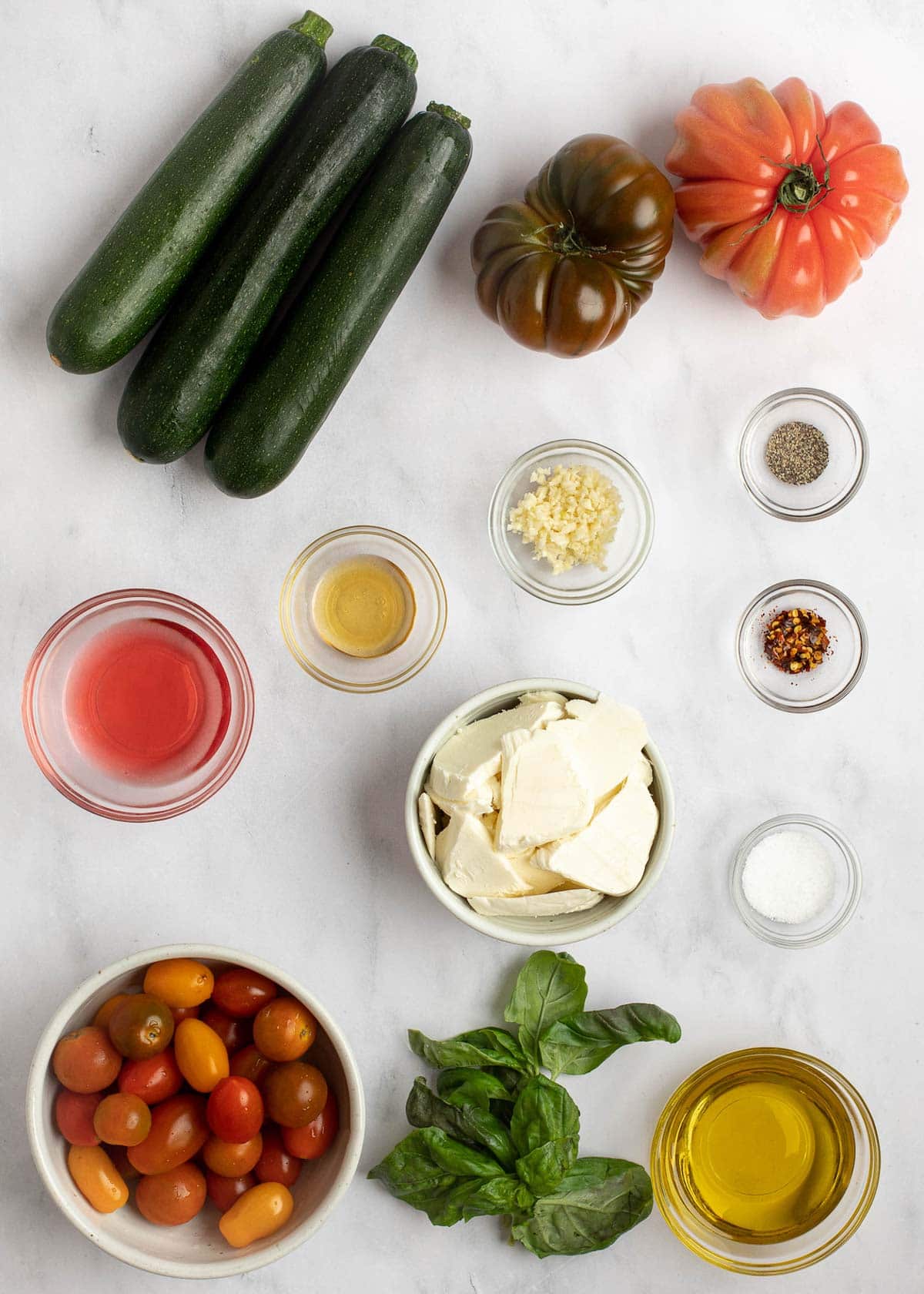 This Grilled Zucchini Salad with a homemade red wine vinaigrette will be your repeat meal of the summer! This healthy recipe is ready in under 30 minutes, loaded with fresh mozzarella and tender veggies, and has fewer than 5 net carbs.