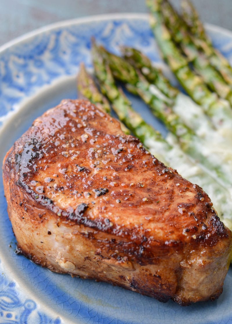 Learn exactly how to cook a thick cut pork chop so it is perfectly tender and juicy! 