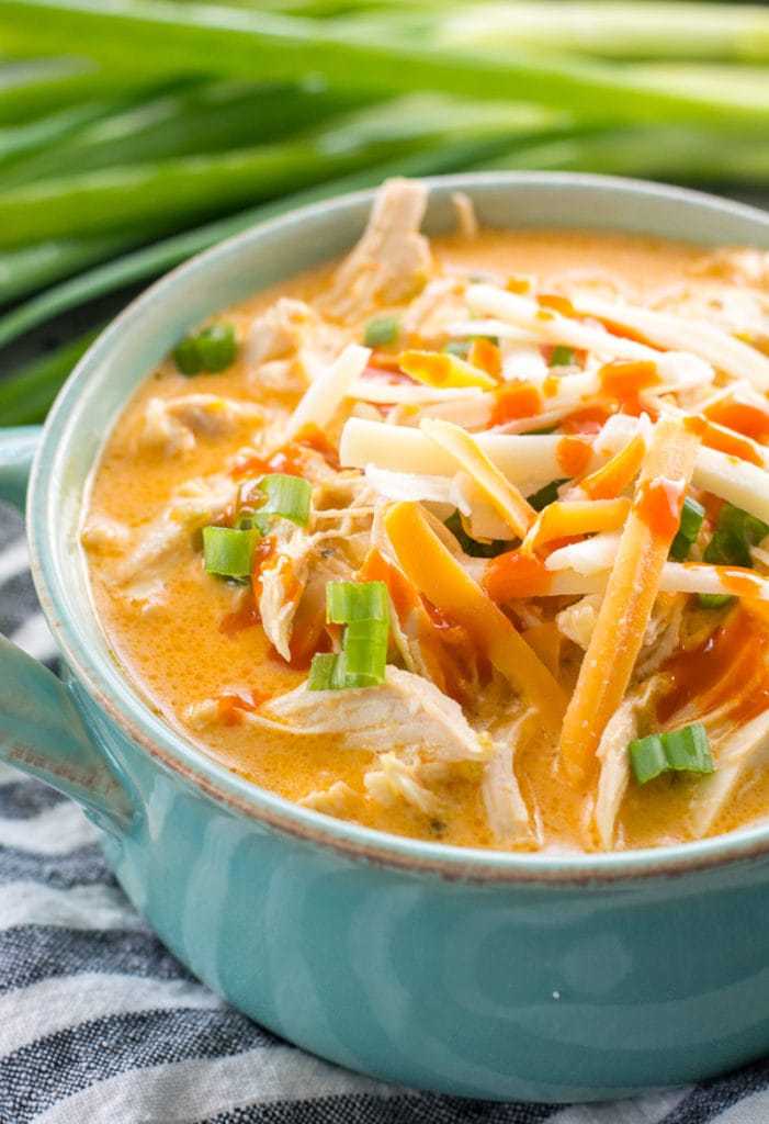 This low carb Instant Pot Buffalo Chicken Soup is loaded with tender shredded chicken, spicy buffalo sauce and tons of cheese! Under 5 net carbs per serving and perfect for keto meal prep! #keto