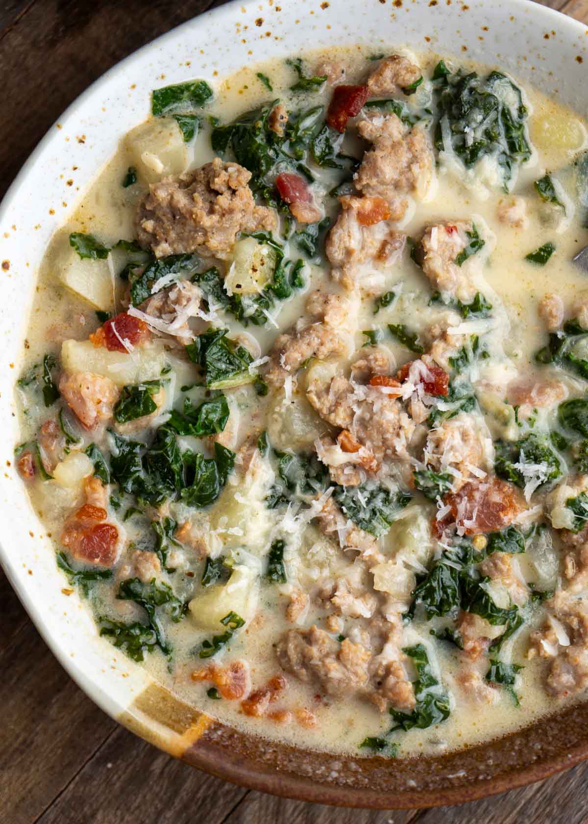 a bowl of zuppa toscana soup