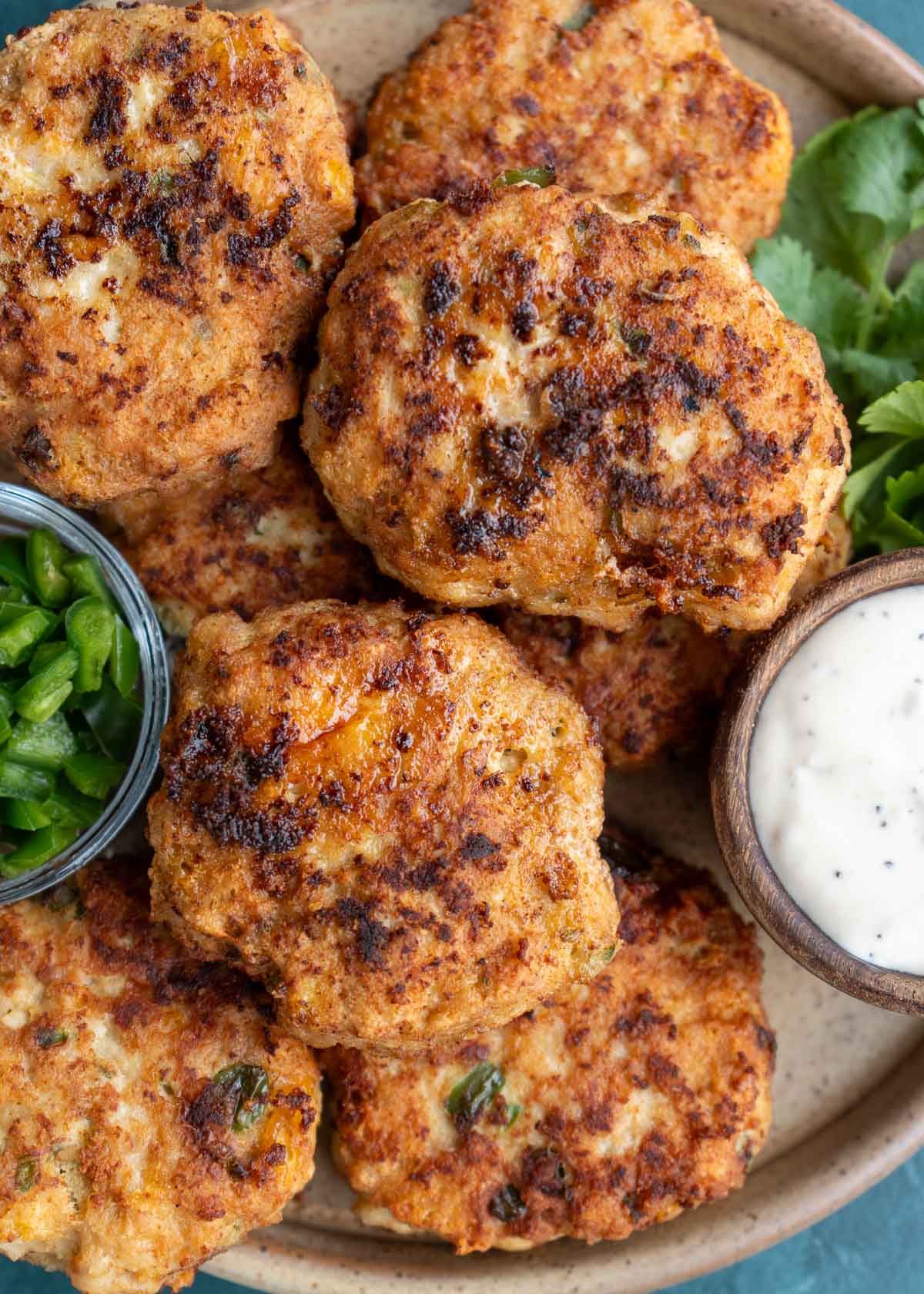 an overhead shot of cheesy chicken fritters