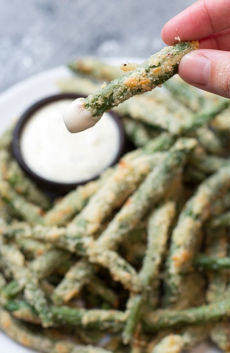 Try these low carb Crispy Green Bean Fries perfect for a game day snack! You can make these keto fries in the oven or air fryer!  #keto