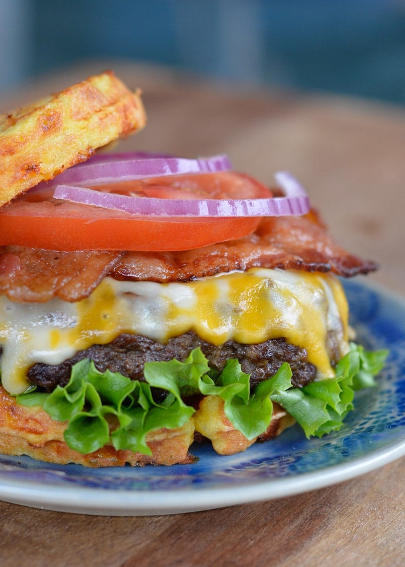 Enjoy a juicy Keto Bacon Cheeseburger for under 7 net carbs! This low carb burger recipe can be made on the grill, in a skillet or in an air fryer! 