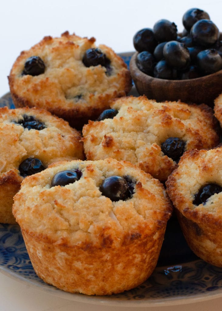 These Easy Keto Blueberry Muffins are the perfect way to start the day! Large fluffy coconut flour muffins are packed with blueberries for about 4 net carbs each. 