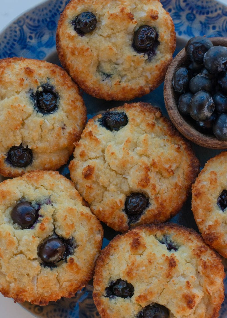 These Easy Keto Blueberry Muffins are the perfect way to start the day! Large fluffy coconut flour muffins are packed with blueberries for about 4 net carbs each.