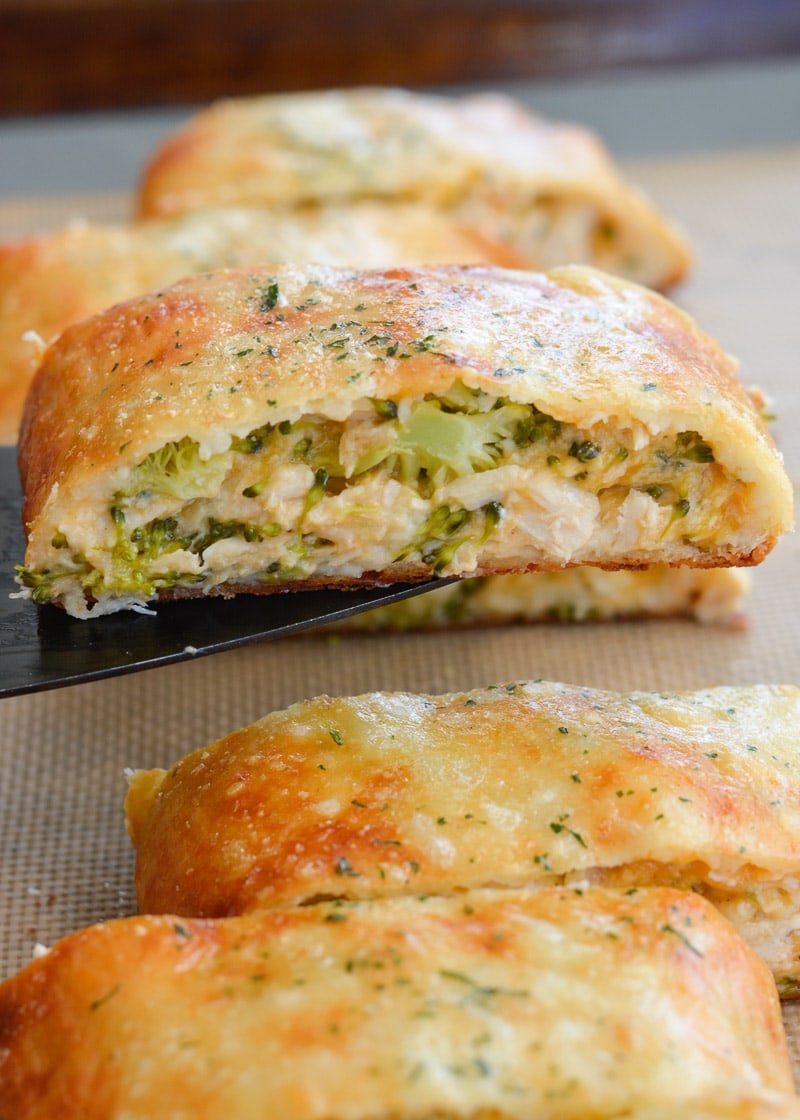 This Chicken Broccoli Cheddar Hot Pocket is loaded with tender chicken, fresh broccoli and loads of cheese wrapped in a perfectly soft and fluffy crust! Each slice is about 3 net carbs!