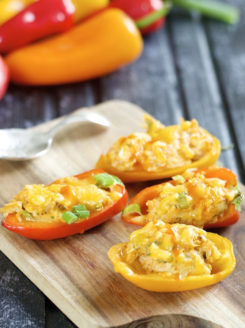 These Keto Buffalo Chicken Stuffed Peppers are packed with tender chicken, buffalo sauce and cheese! This is the perfect easy keto dinner or appetizer for about 5 net carbs per serving!