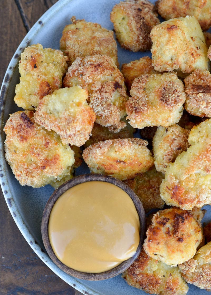 These delicious Keto Chicken Nuggets can be baked or air-fried and are low carb and gluten free! These make a perfect lunch or easy dinner for under 4 net carbs!