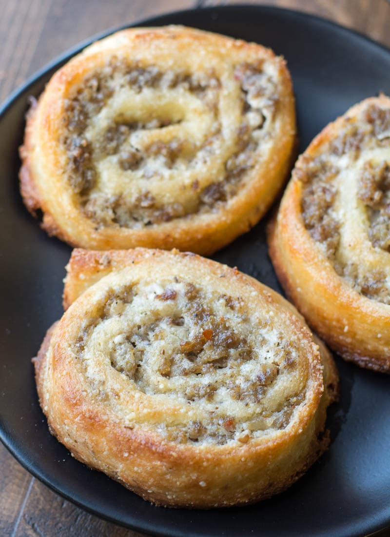 The perfect keto appetizer! Keto Sausage Cream Cheese Pinwheels are made with fat head dough and loaded with sausage and cream cheese! Just two net carbs per serving! #keto 