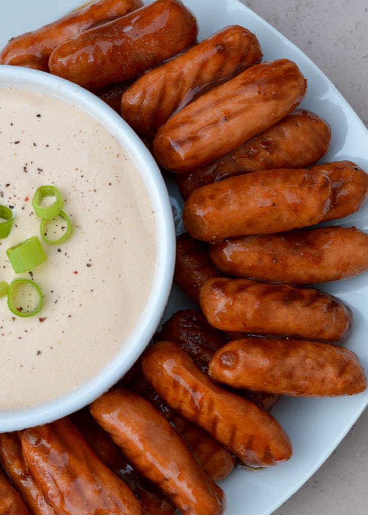 This easy Keto Lil Smokies Recipe uses the crock pot for a no-fuss appetizer. Under 4 carbs for this classic potluck and party favorite!