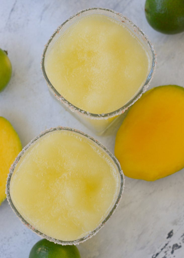 This beautiful Mango Margarita is keto friendly and perfect for a hot summer day! Low carb, low calorie, and no added sugar -- Just 3.4 net carbs!