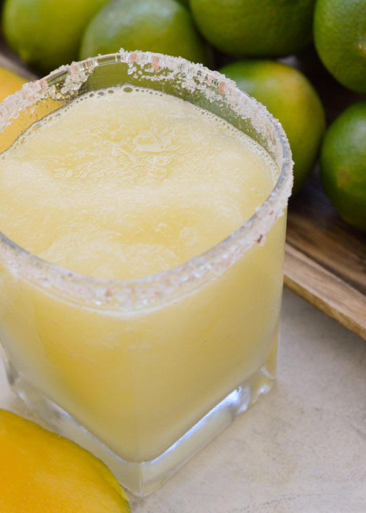 This beautiful Mango Margarita is keto friendly and perfect for a hot summer day! Low carb, low calorie, and no added sugar -- Just 3.4 net carbs!