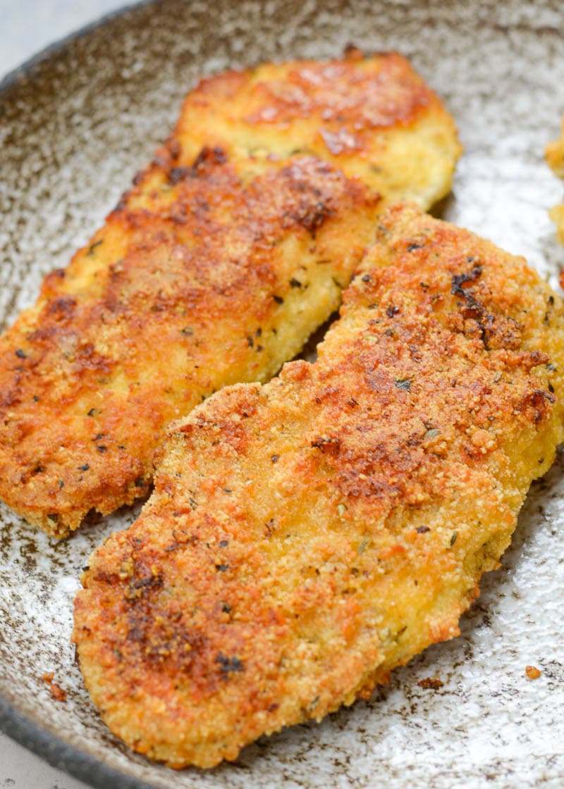 This low carb, gluten free Keto Oven Fried Chicken is exactly what your family ordered! Tender chicken that's "fried" in the oven, this meal is lightened-up comfort food at it's finest!