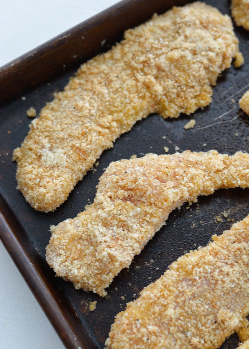 This low carb, gluten free Keto Oven Fried Chicken is exactly what your family ordered! Tender chicken that's "fried" in the oven, this meal is lightened-up comfort food at it's finest!