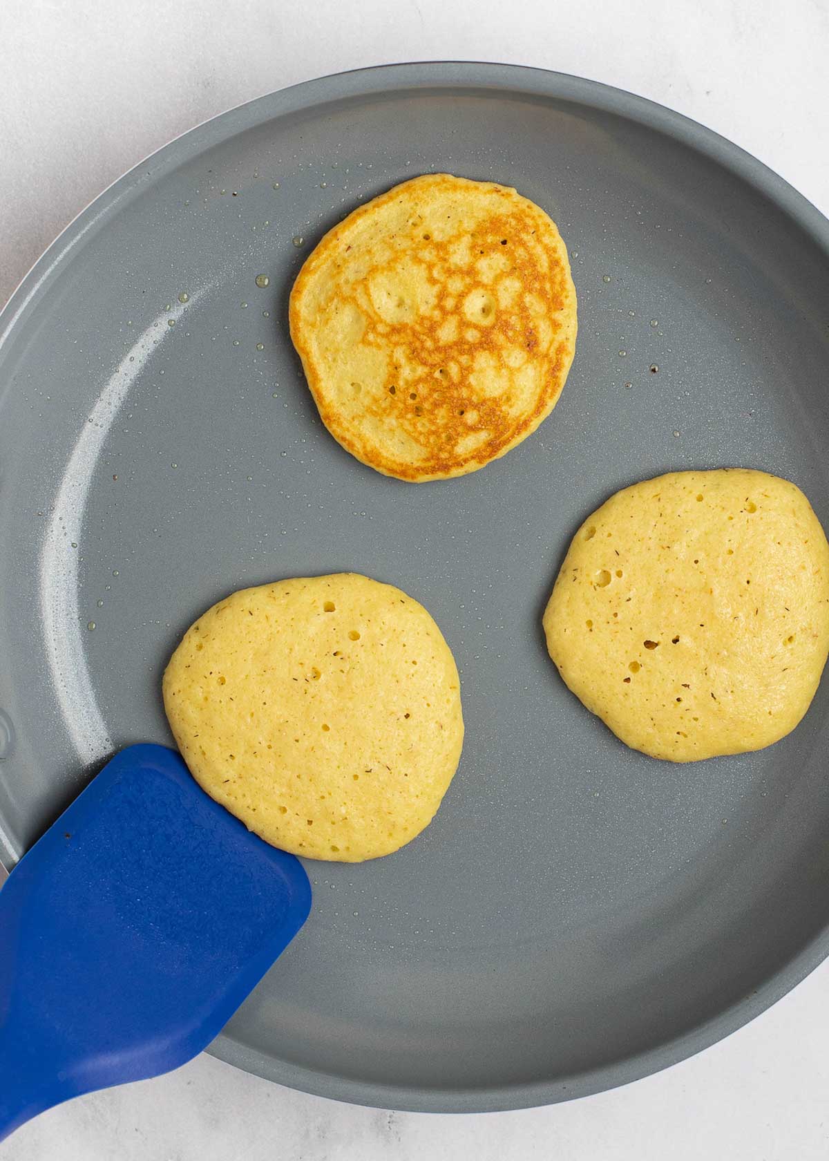 These fluffy Keto Pancakes come out perfect every time! Enjoy three low-carb, gluten-free pancakes for less than 5 net carbs!