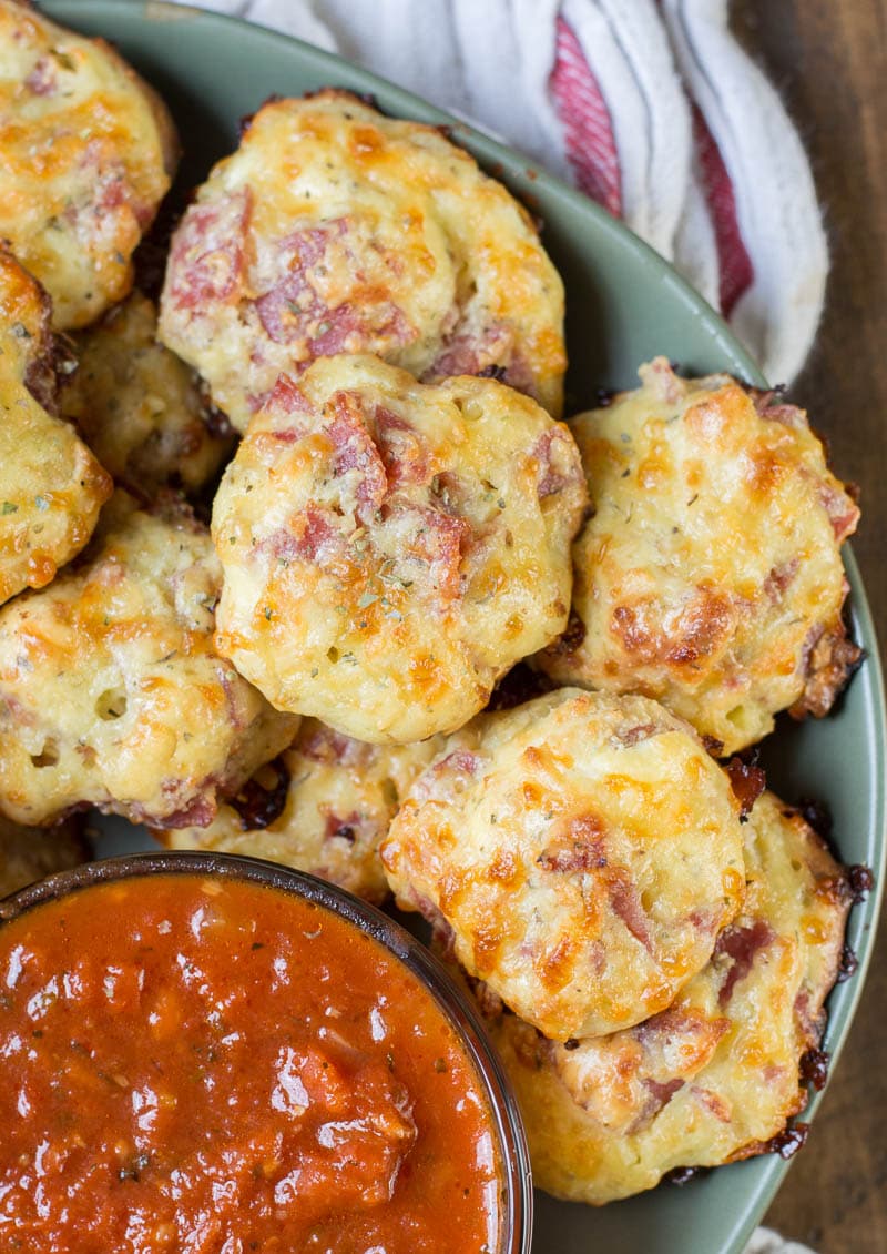 Easy Keto Pepperoni Pizza Bites are bursting with pepperoni and mozzarella cheese! At less than one net carb each these make the perfect low carb lunch! #keto