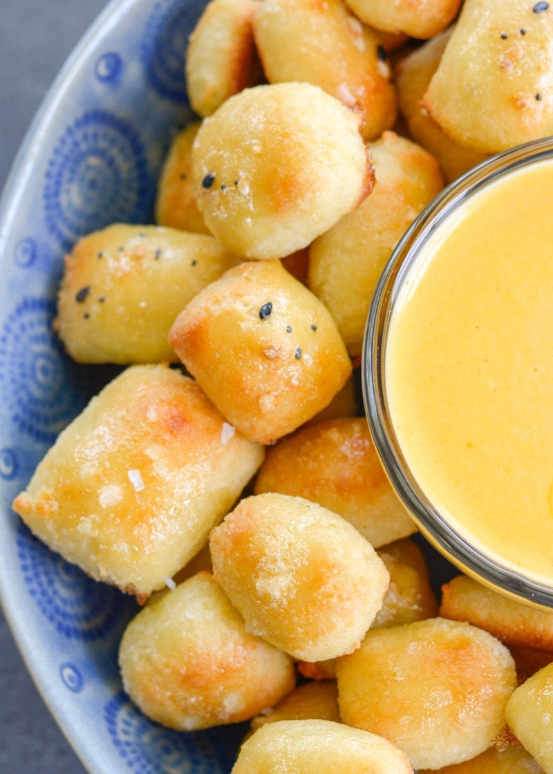 These soft Keto Pretzel Bites with Cheese Sauce are the perfect low carb appetizer! Enjoy 8 bites with cheese dip for less than 5 net carbs! 