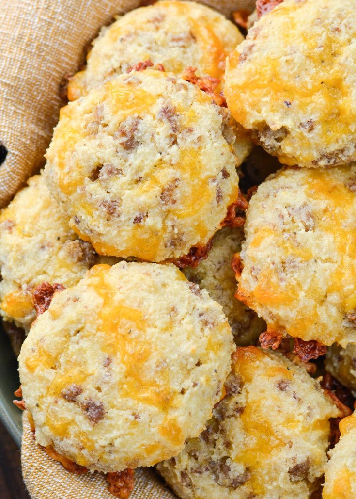 These Keto Sausage Cheddar Biscuits are loaded with flavor and have less than two net carbs each. Pair with scrambled eggs and enjoy the perfect keto breakfast! 