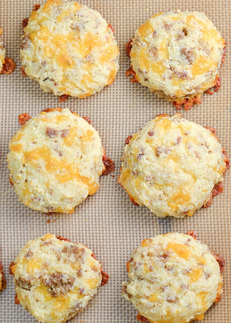 These Keto Sausage Cheddar Biscuits are loaded with flavor and have less than two net carbs each. Pair with scrambled eggs and enjoy the perfect keto breakfast! 