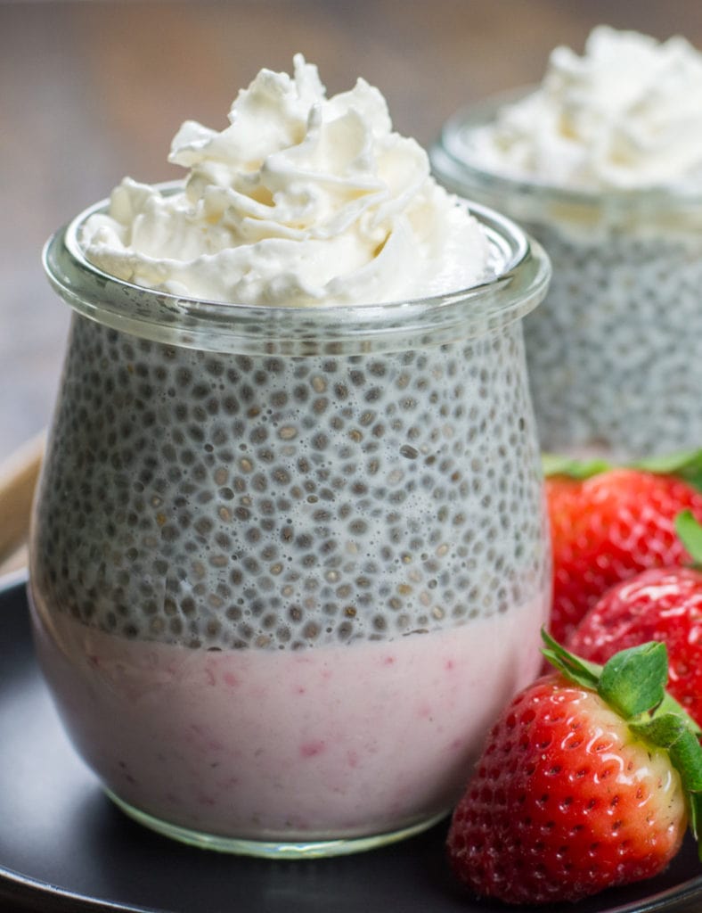 This decadent Keto Strawberry Cheesecake Parfaits feature a creamy strawberry cheesecake layer topped with vanilla chia seed pudding! A sweet keto treat under 5 net carbs!