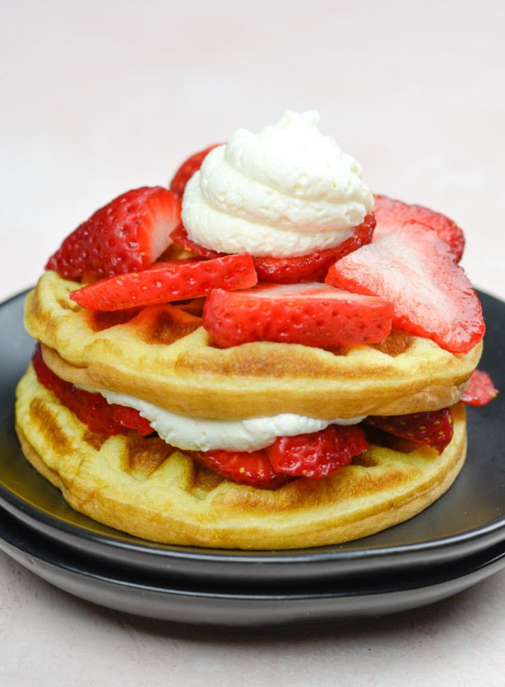 Enjoy a plateful of these Keto Strawberry Shortcake Waffles for about 5 net carbs each! This is the perfect low carb breakfast!