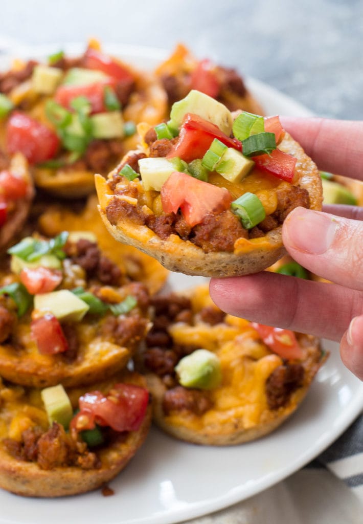 These easy Keto Taco Cups are made with low carb fat head dough, seasoned taco meat and cheddar cheese! Each cup is less than 2 net carbs and loaded with taco flavor! #keto