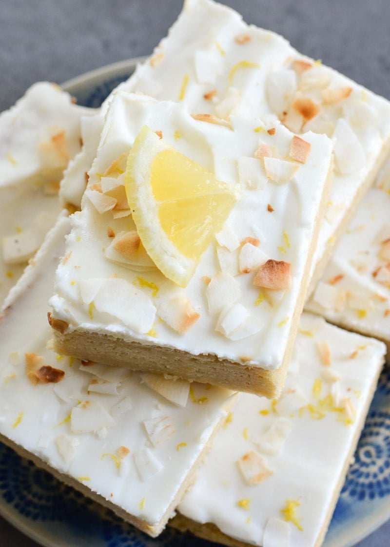 These refreshing Lemon Blondies are covered in a sweet lemon and cream cheese frosting! This keto-friendly treat has less than 3 net carbs per serving! 